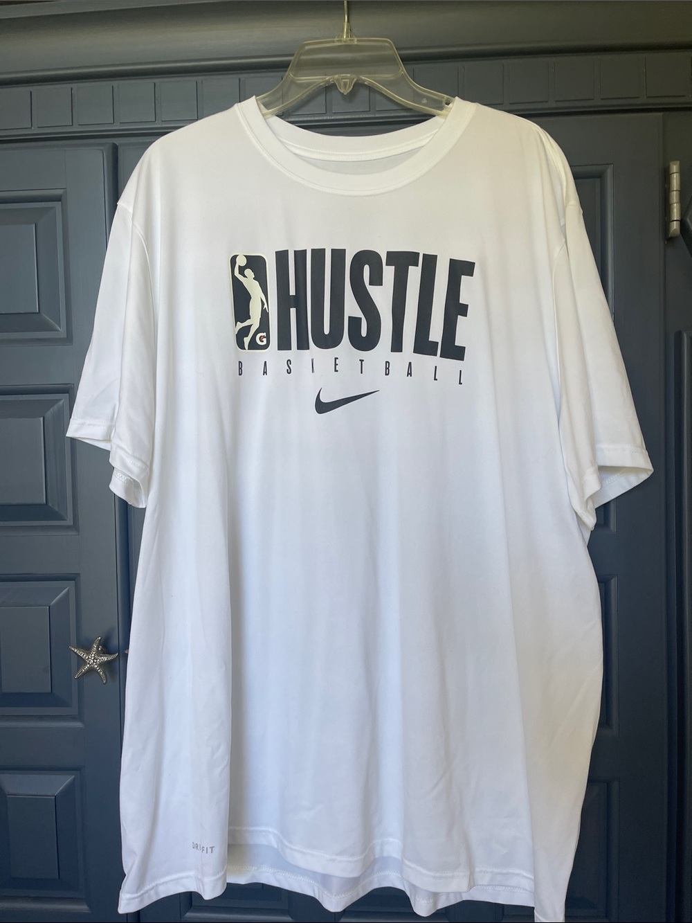 Nike White Hustle Basketball Short Sleeve Tee with Black Graphic